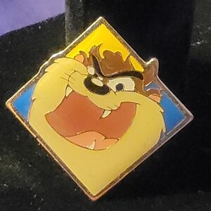 Taz Looney Tunes Lapel Pin is a vintage collectible from 1993 Tasmanian Devil